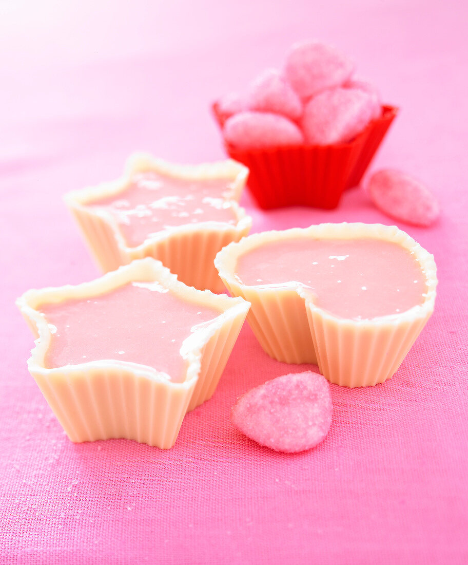 Pink Tagada strawberry mousse in white chocolate casings