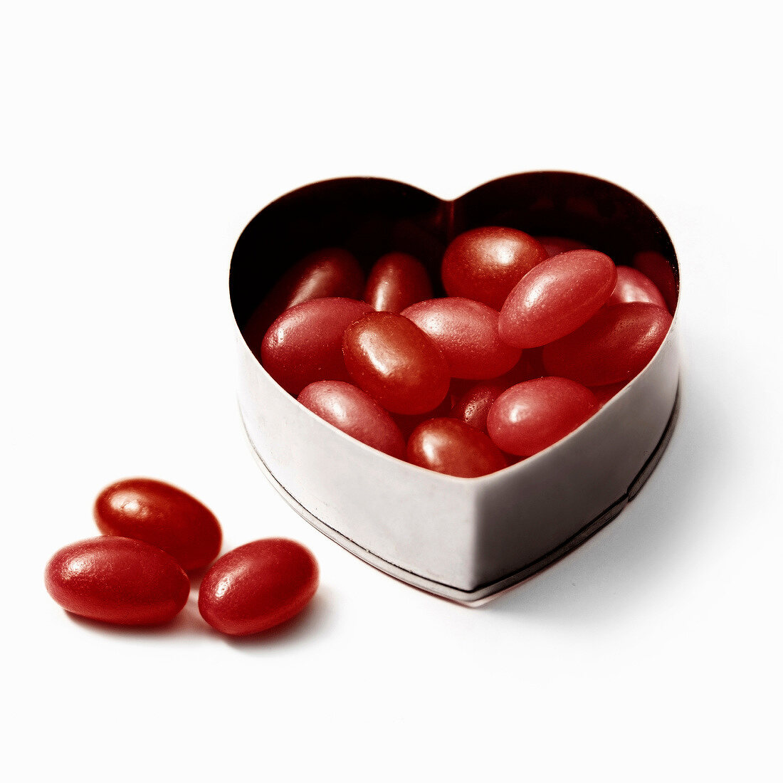 Heart-shaped tin box with summer fruit sweets