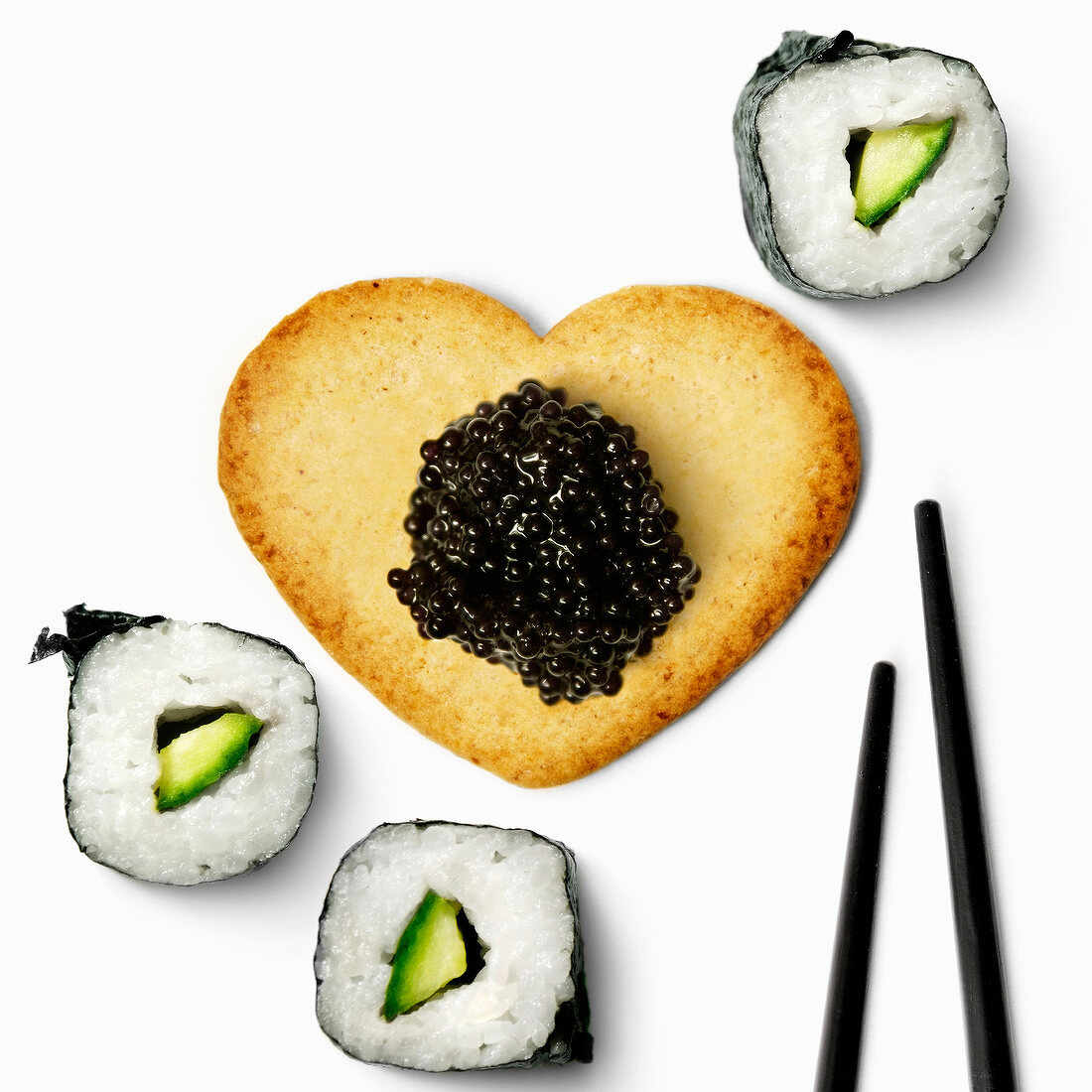 Heart-shaped biscuit ,fish roe and makis