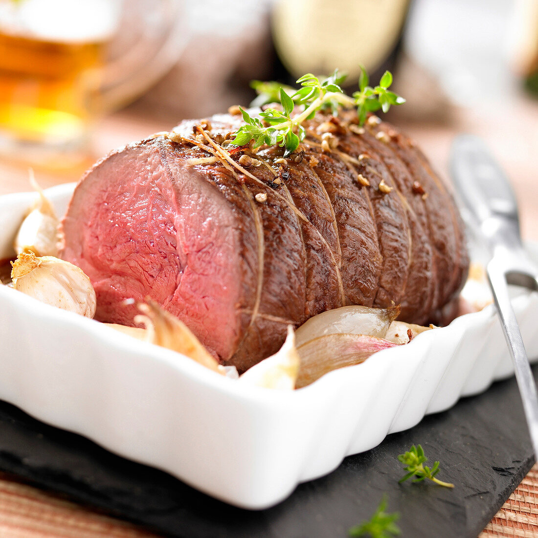 Roast wild boar with beer and garlic