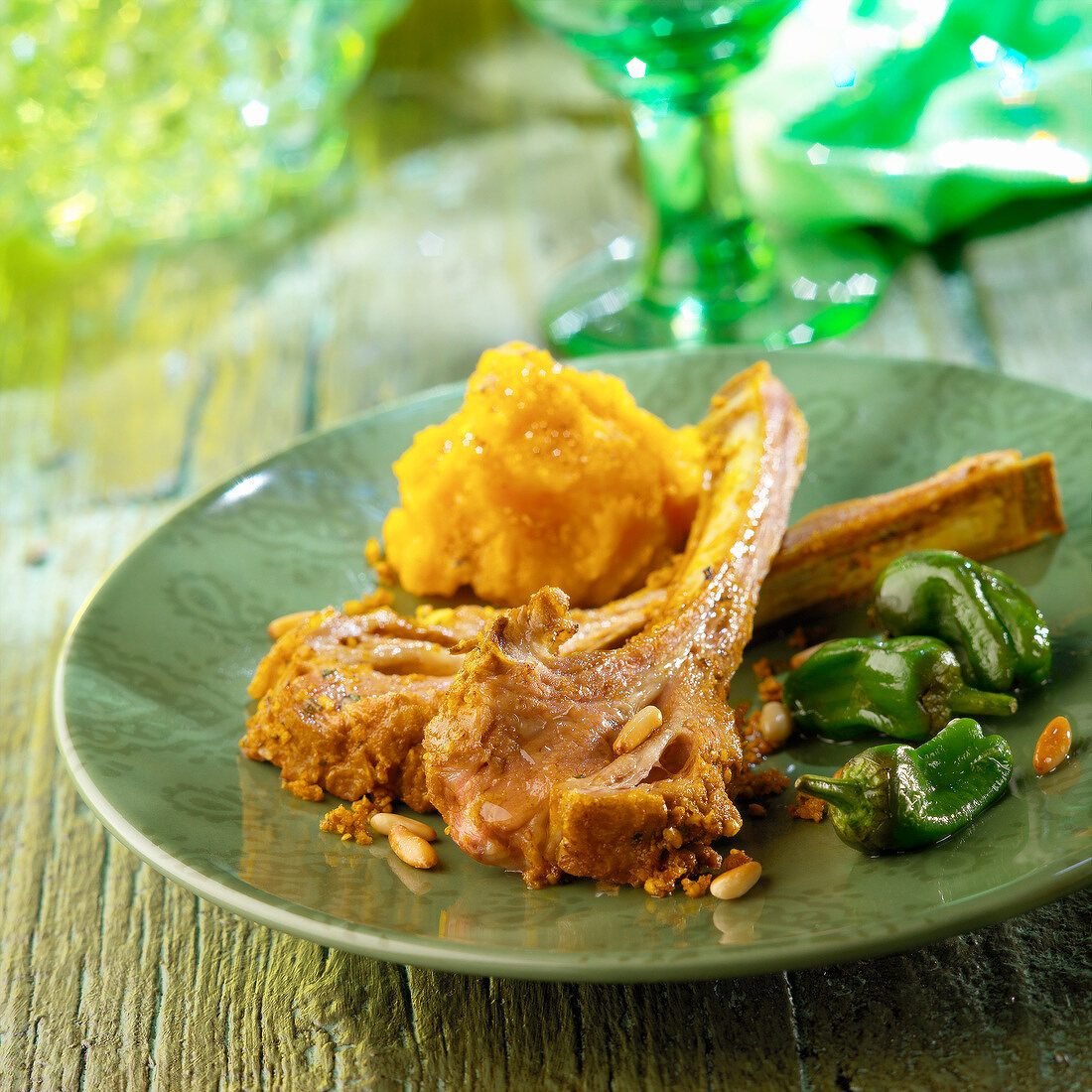 Lamb chips with turmeric and pine nuts,pumpkin mash and green peppers