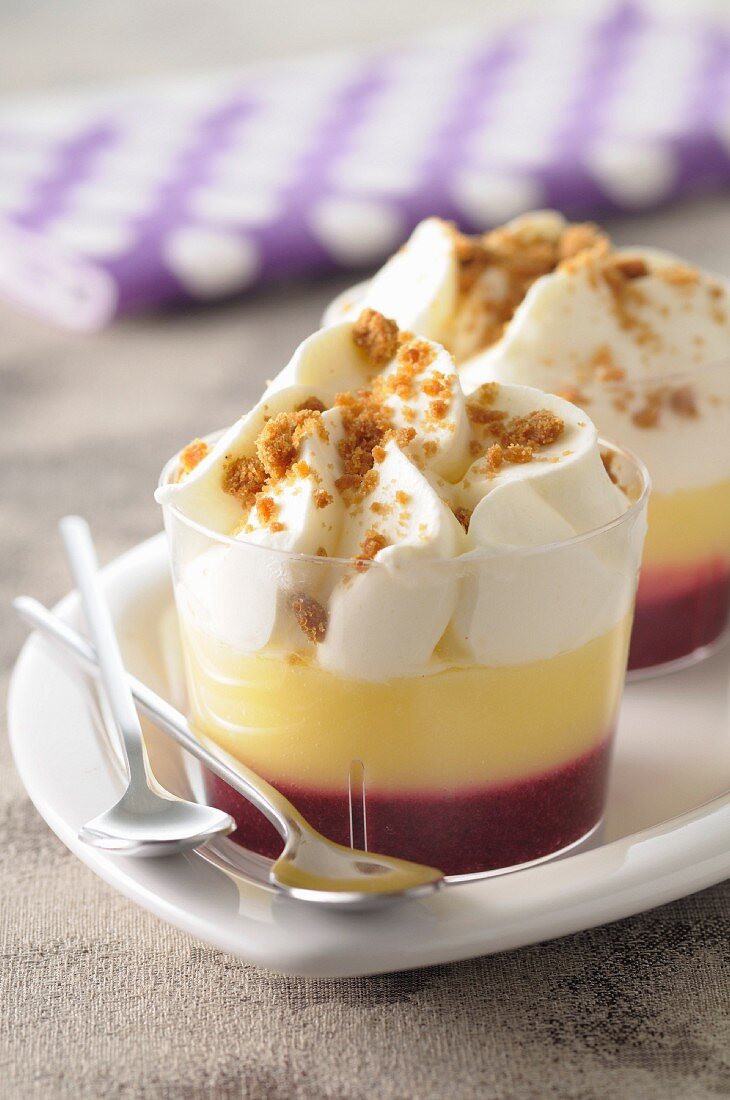 Blackcurrant,lemon curd and whipped cream desserts
