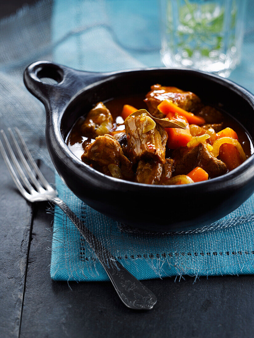 Beef stew with hot peppers,carrots and rum
