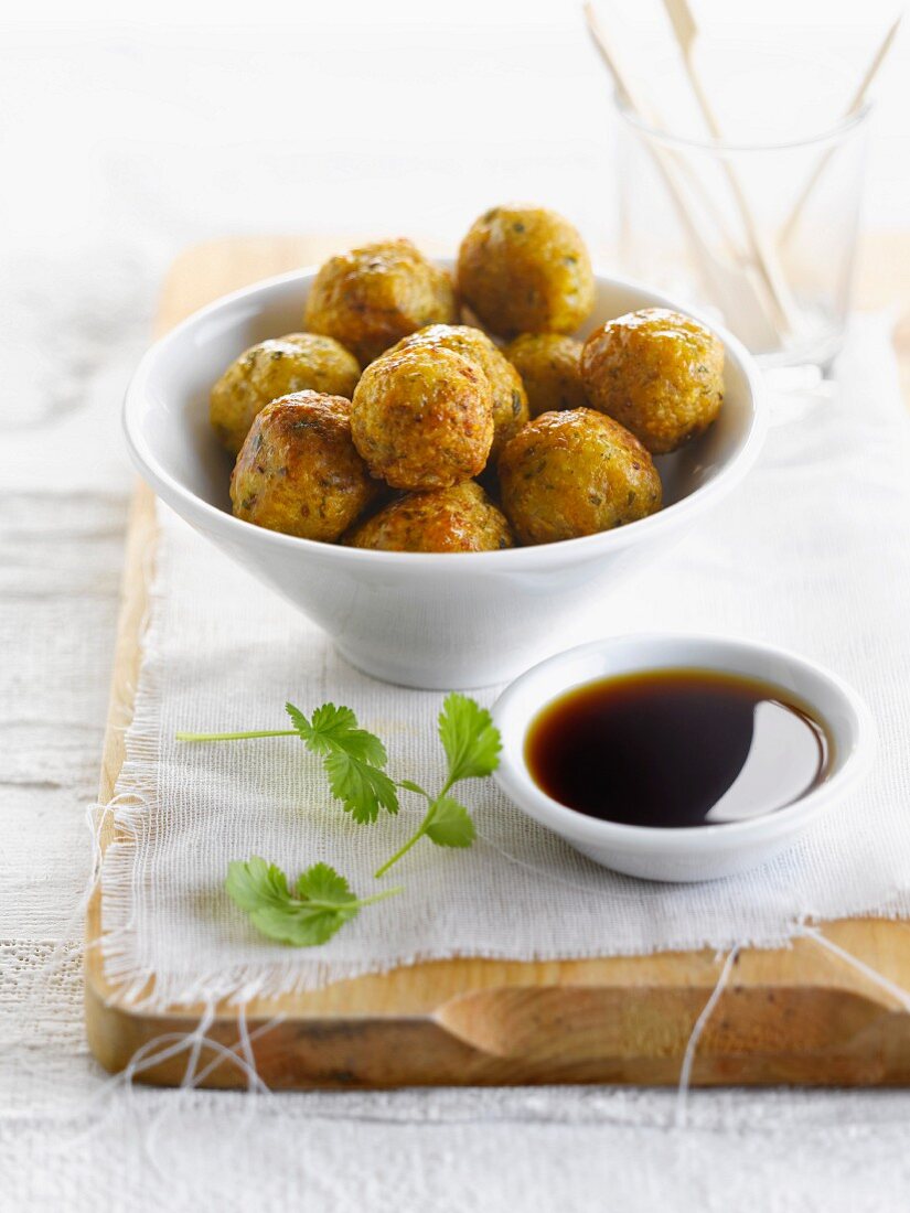 Chicken and herb meatballs with soya sauce