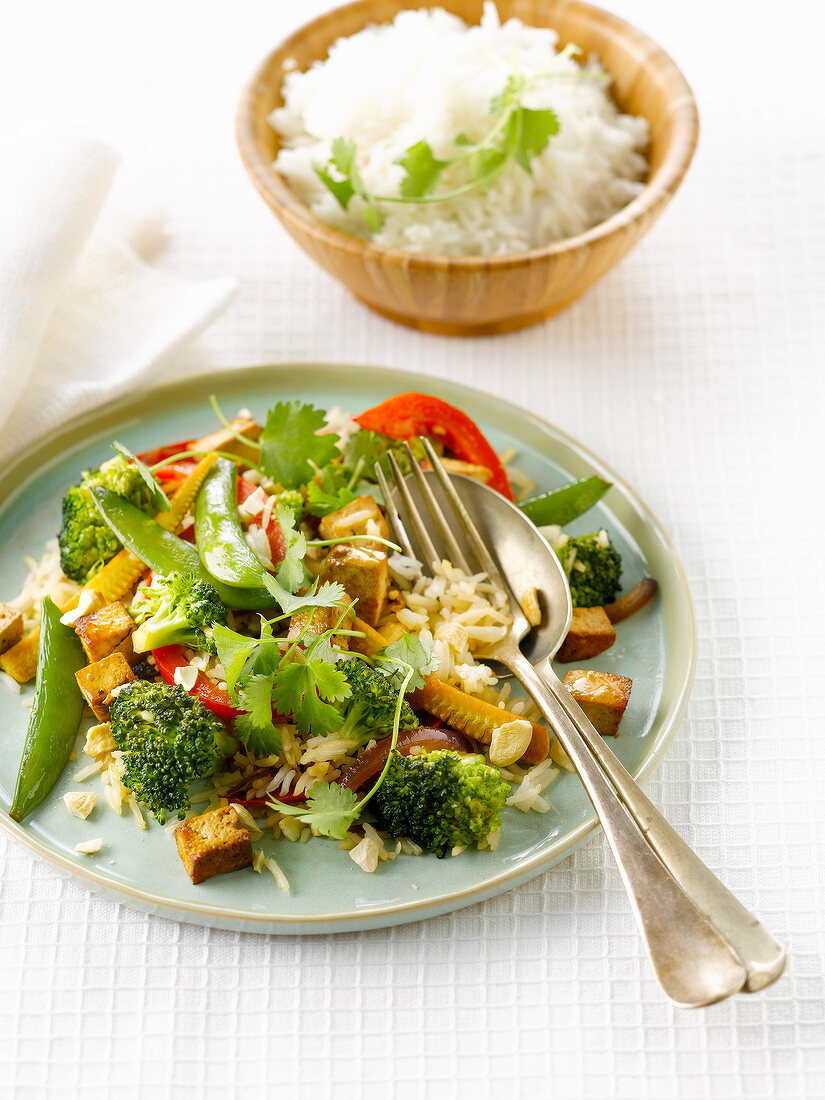 Sauteed rice with tofu,broccolis and sugar peas