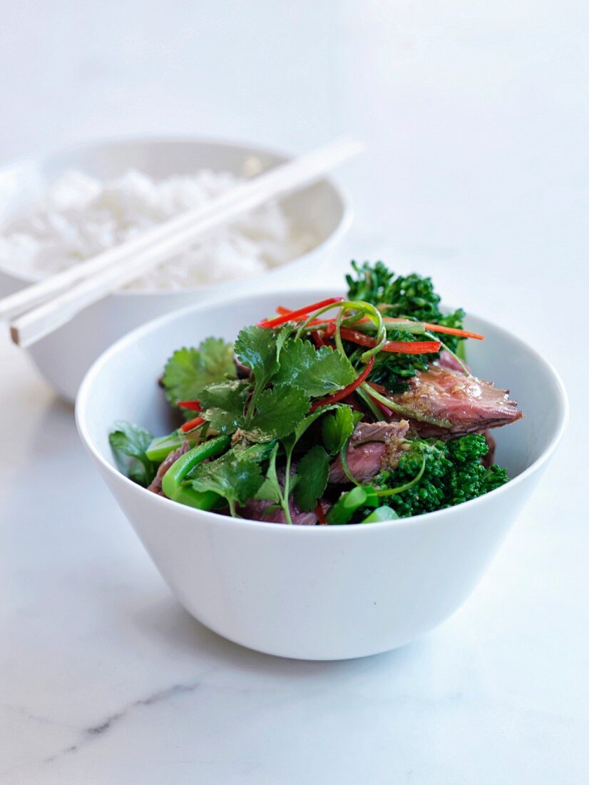 Sauteed broccolis with beef,coriander and green and red peppers,basmati rice