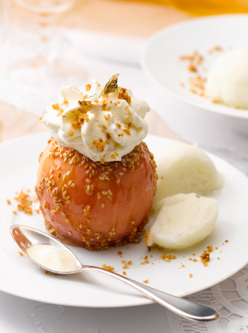 Caramelized baked apple with sesame seeds and whipped cream,apple sorbet