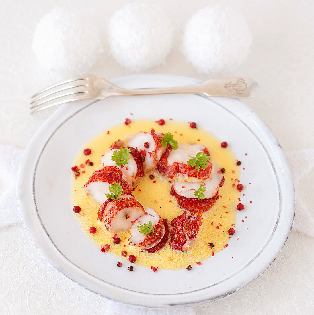 Lobster tail in Champagne zabaglione with pink pepper