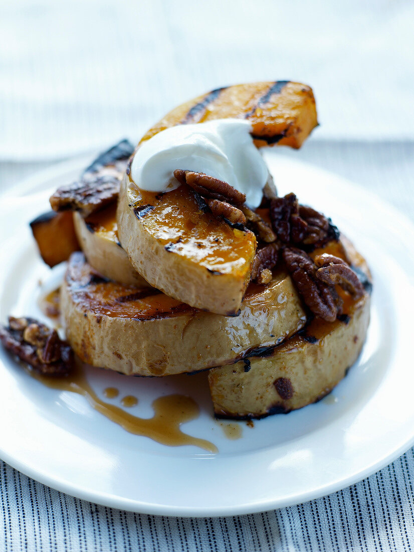 Grilled pumpkin with pecans and spicy maple syrup