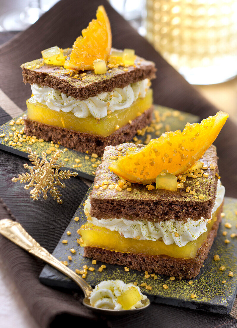 Chocolate sponge cake with orange curd, whipped cream and green tea