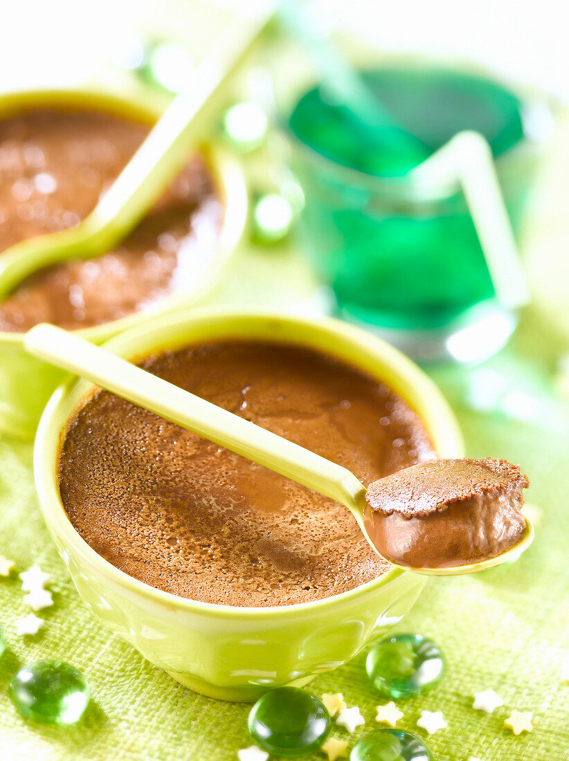 Small pots of dark chocolate cream dessert