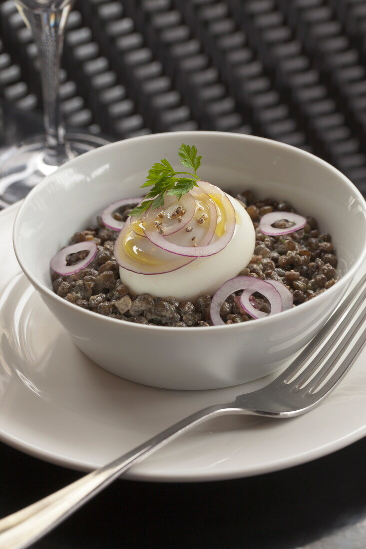Lentils with soft-boiled egg and onions