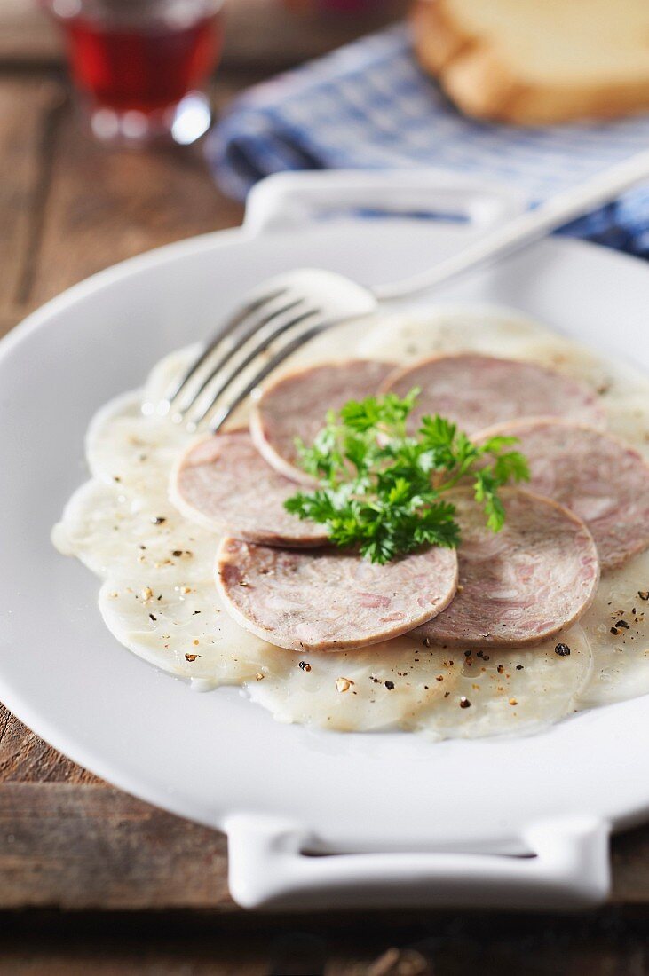 Black cabbage carpaccio and chitterlings sausage from Vire