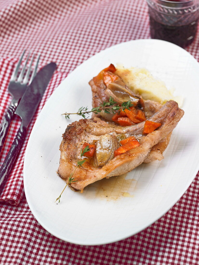 Pork chops with carrots and confit shallots
