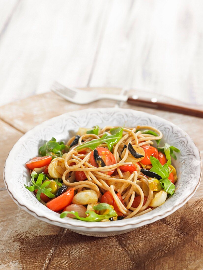 Spaghettis,vegetable and black fermented garlic salad