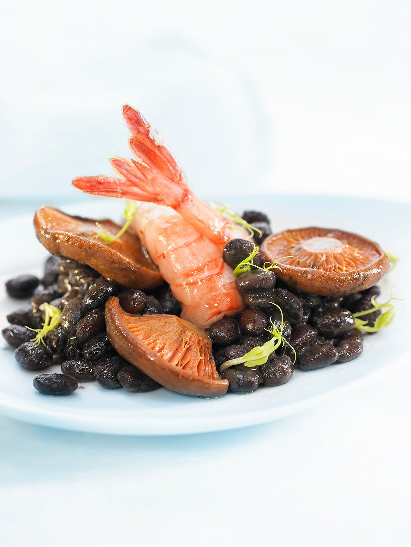 Black beans with mushrooms and Dublin Bay prawns