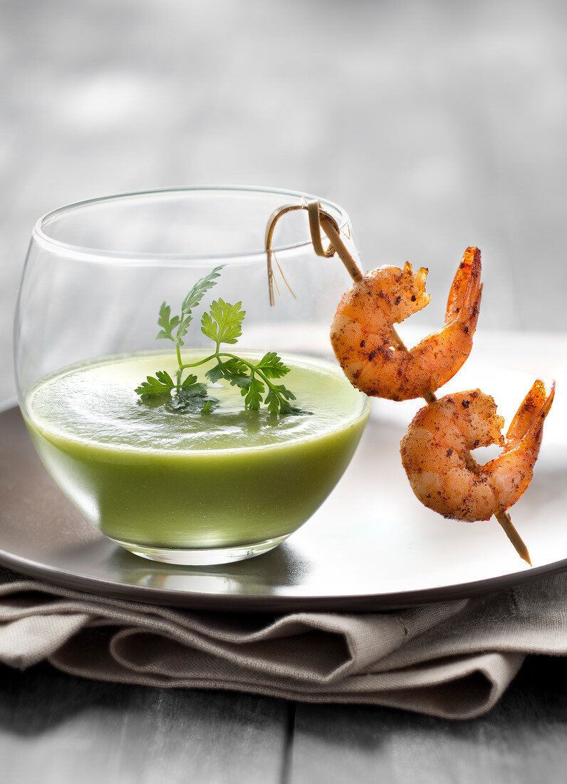 Chilled cream of avocado soup with sauteed paprika shrimps