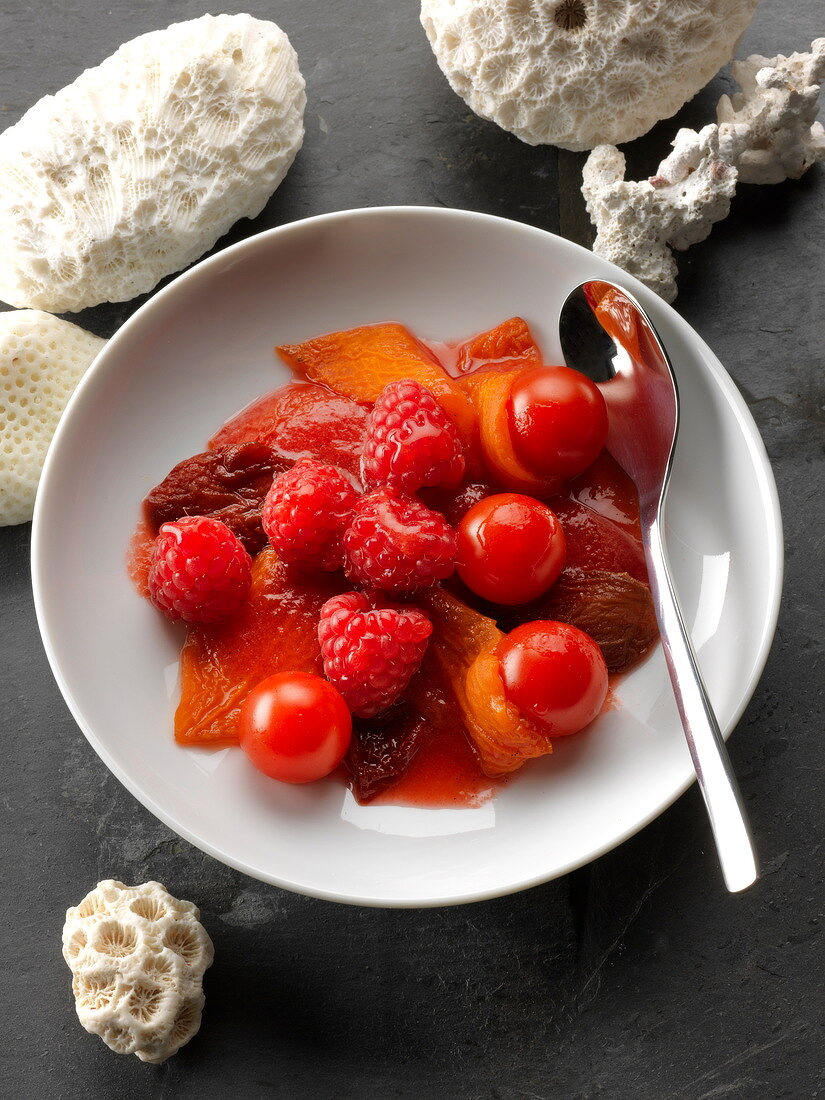 Stewed tomatoes with raspberries and tonka beans
