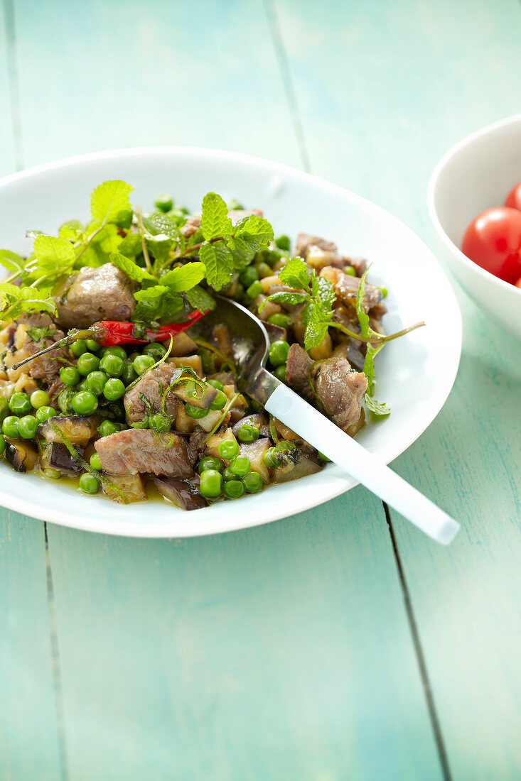 Lamb with peas,eggplants and mint