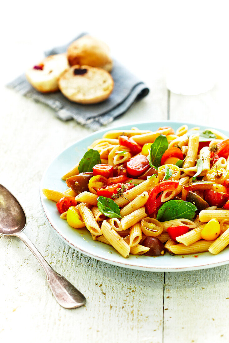 Penne with tomatoes and basil