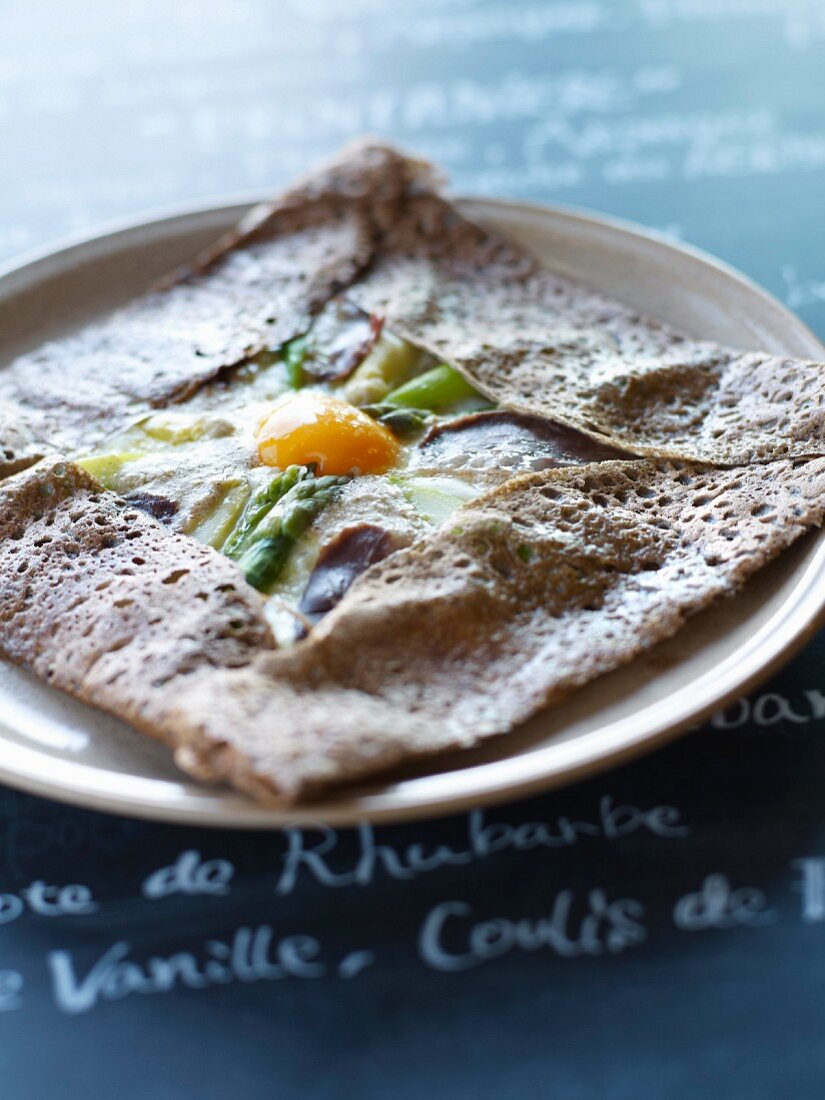Green and white asparagus and egg Galette
