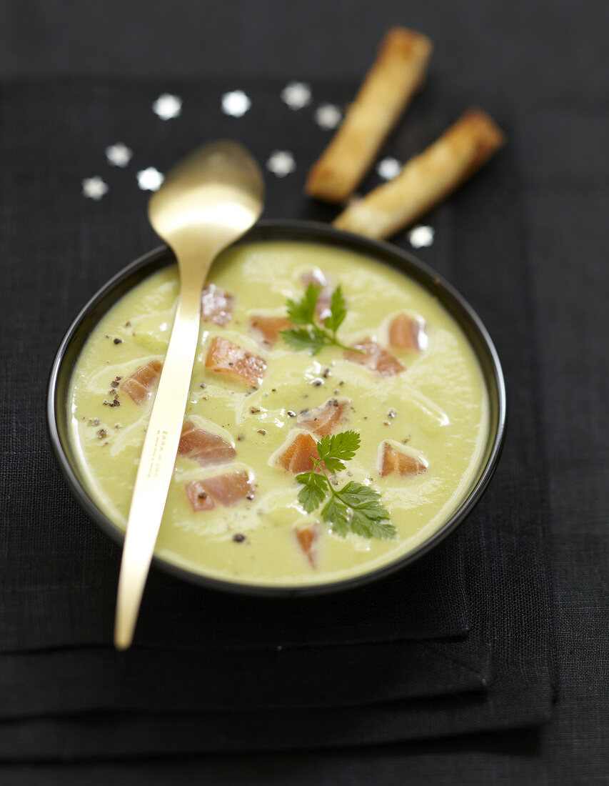 Cream of green asparagus soup with smoked salmon