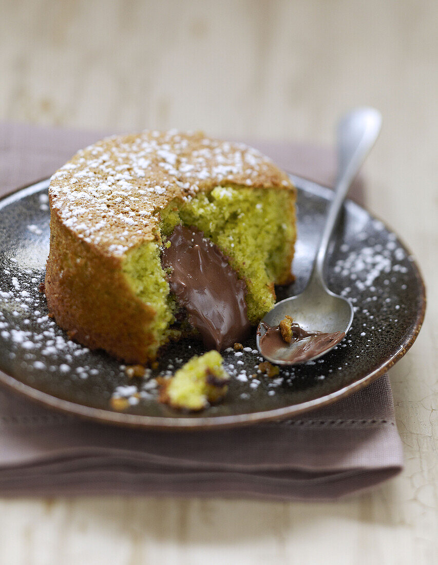 Pistachio fondant with a runny chocolate center