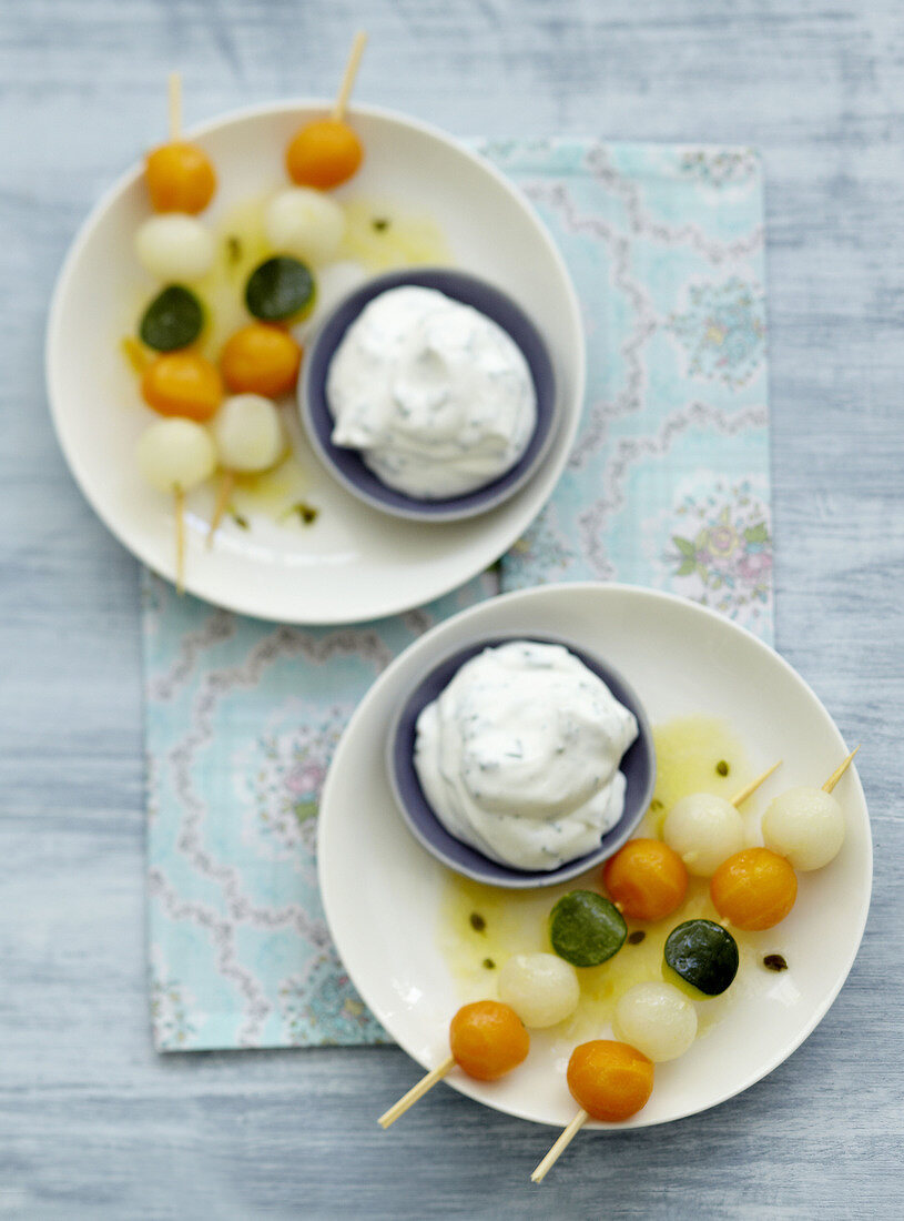 Vegetable ball brochette appetizers and herb whipped cream