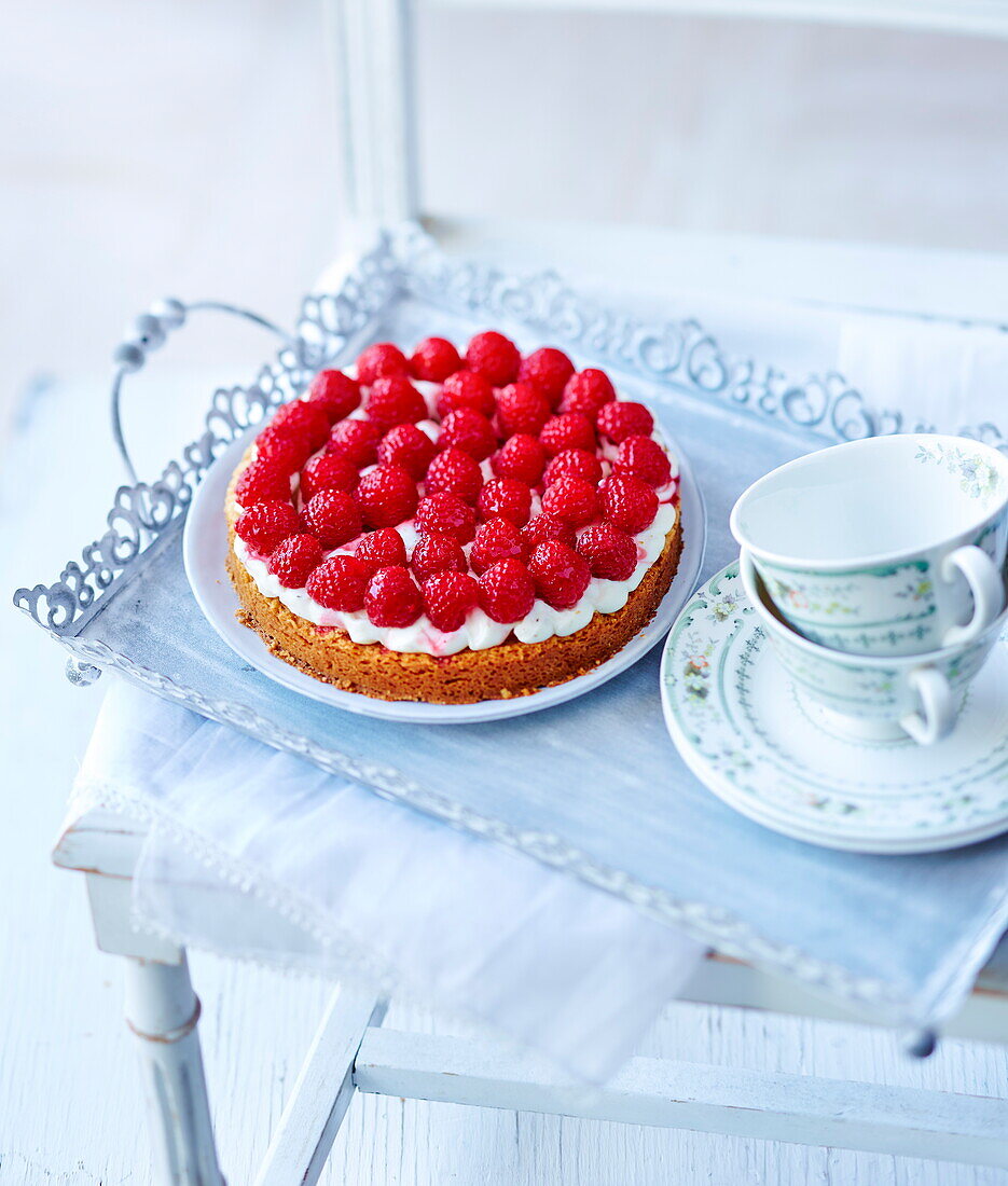 Strawberry cake with mascarpone on a vintage tray