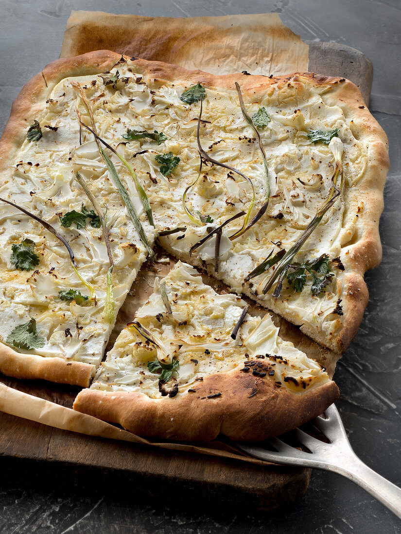 Pizza with cauliflower, ricotta and coriander