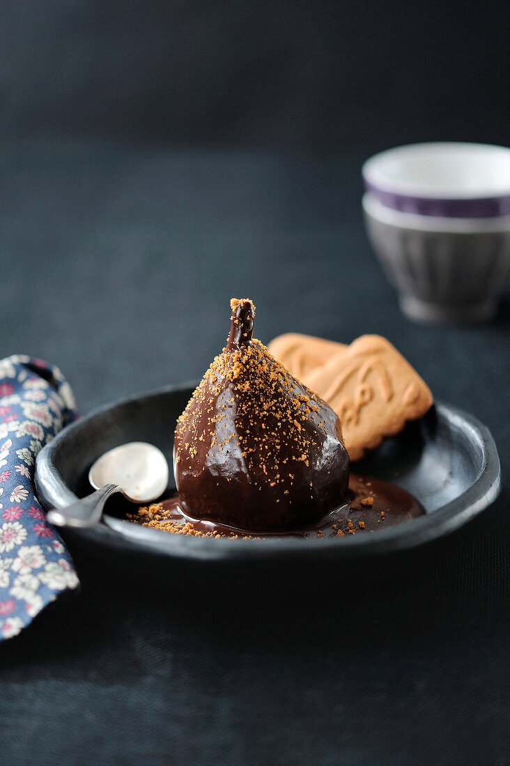Poached pear with melted chocolate
