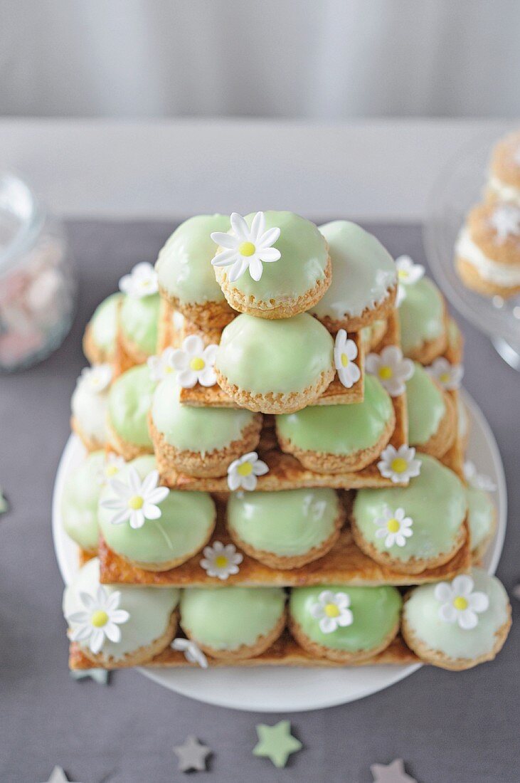 Pyramid of frosted cream puffs