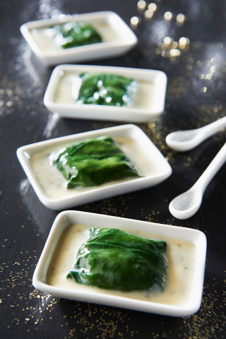 Oyster ans spinach parcels,creamy seaweed butter sauce