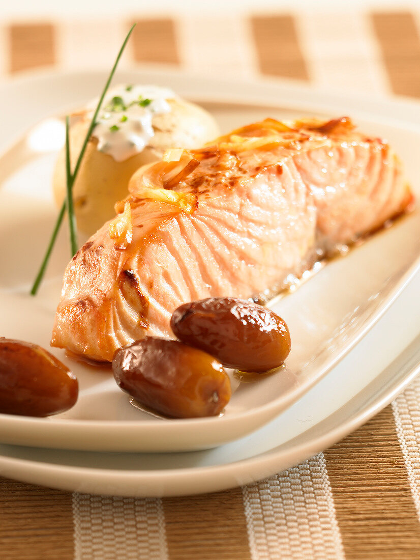 Salmon with shallots,dates and a baked potato