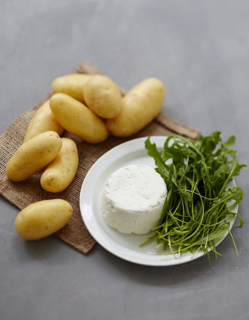 Ingredients for fresh goat's cheese and potato savoury cake