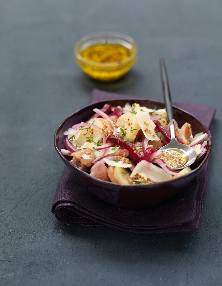 Potato, beetroot, red onion, herring and sheep's milk cheese salad