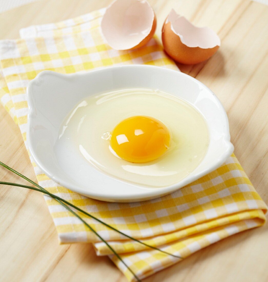 Raw egg in a dish