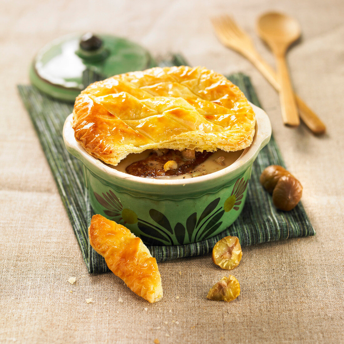 Creamed chestnut soup with foie gras and sealed with pastry