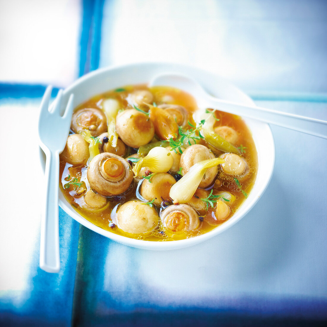 Marinated button mushrooms with spring onions