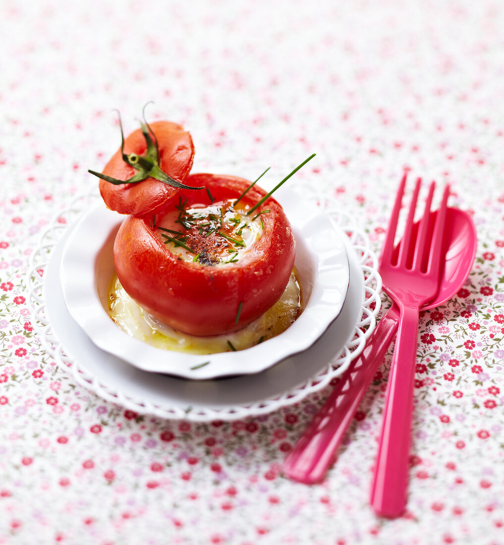 Coodled egg in a tomato