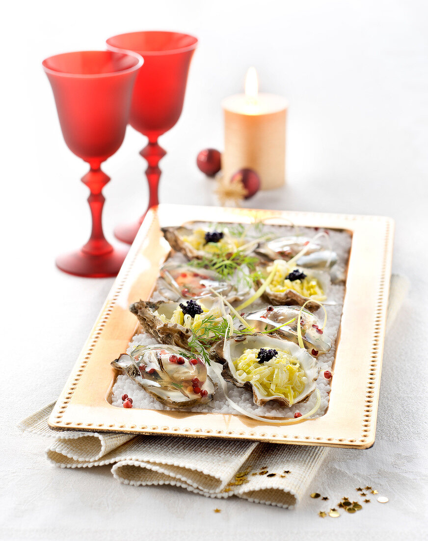 Oysters in Champagne aspic with pink peppercorns, thinly sliced creamy leeks and lumpfish roe