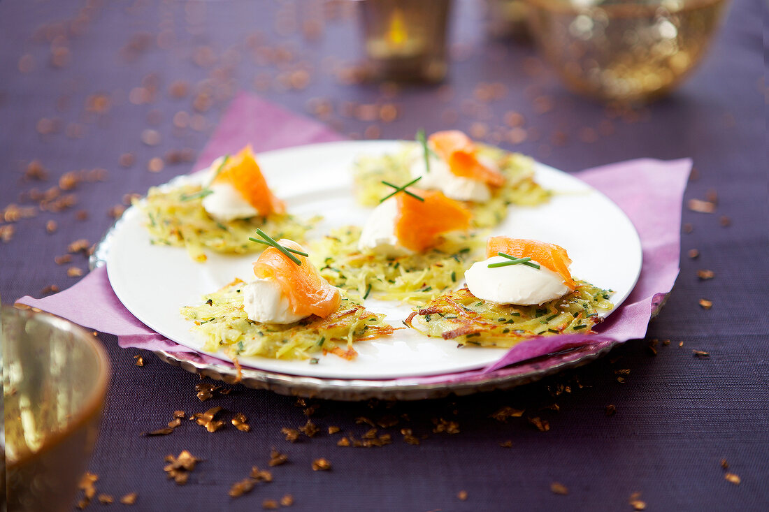 Small potato galettes with poached eggs and salmon