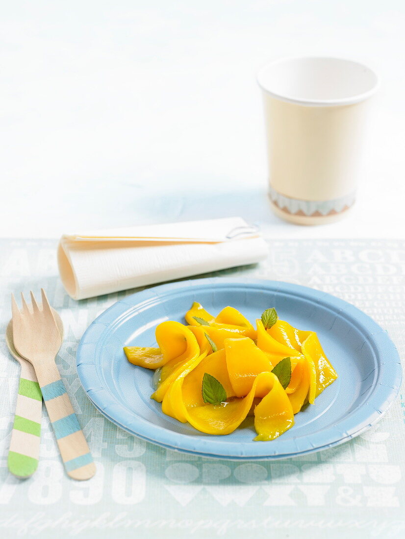 Mango fruit salad with basil and lemon grass