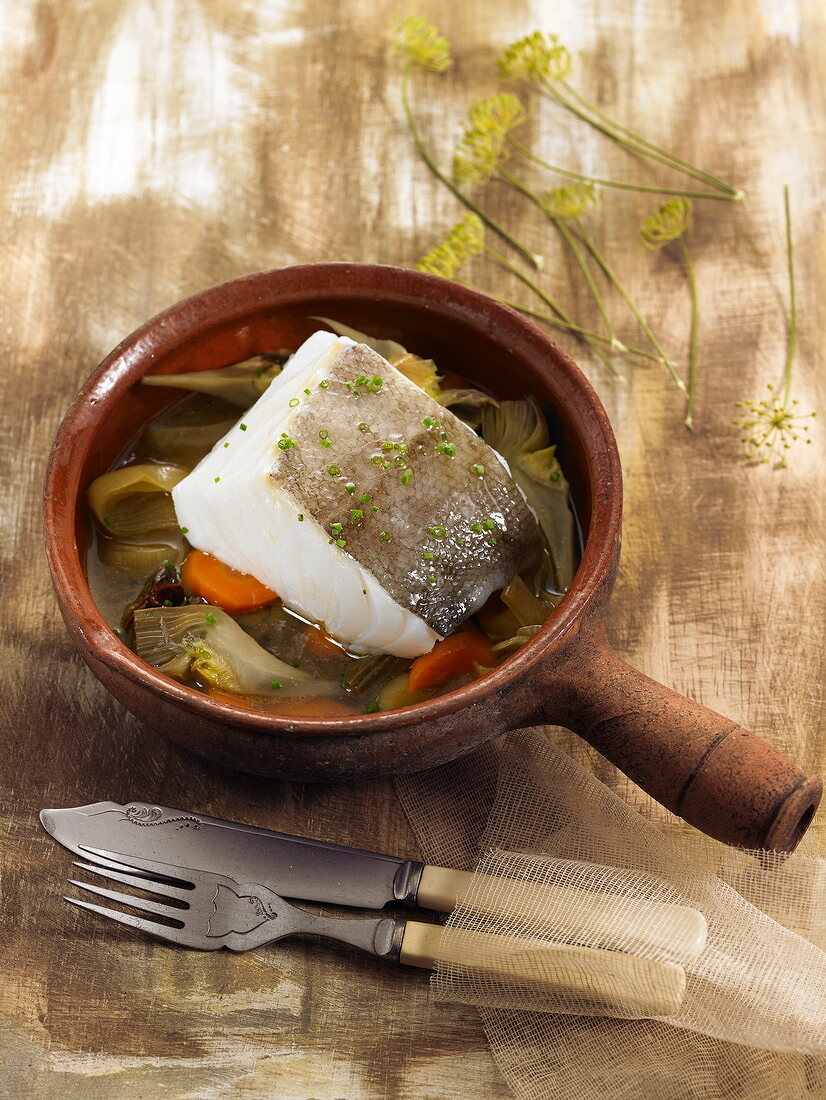 Stewed salt cod with artichokes and carrots