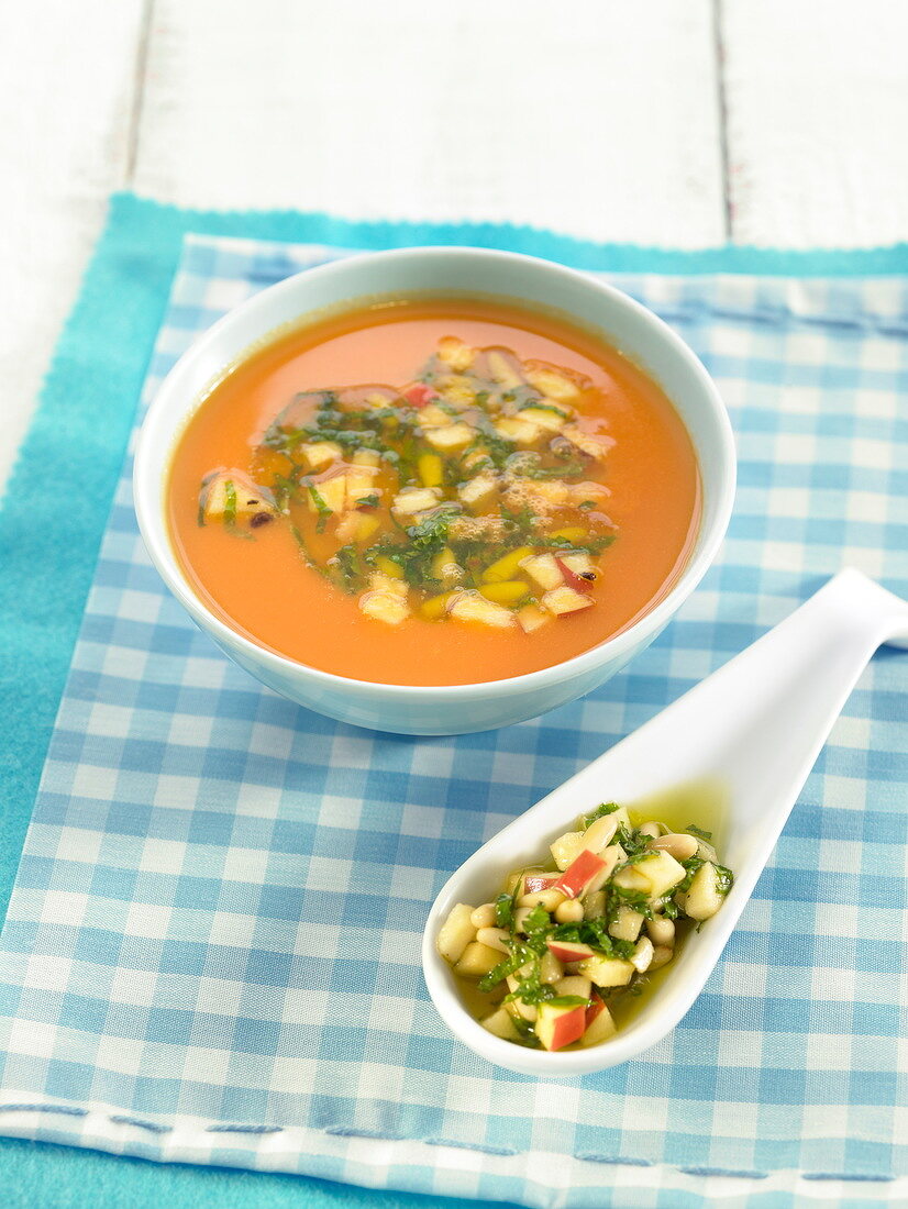 Cream of carrot soup with diced vegetables