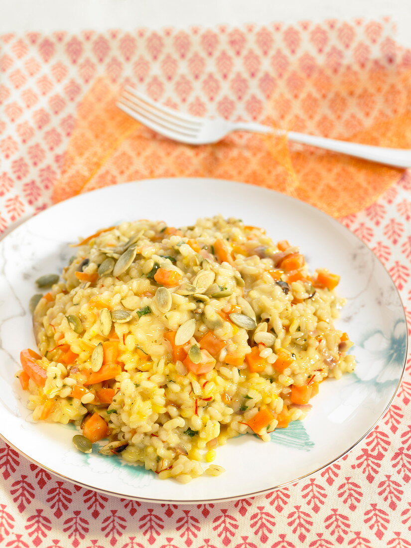 Rice in creamy saffron sauce with seeds