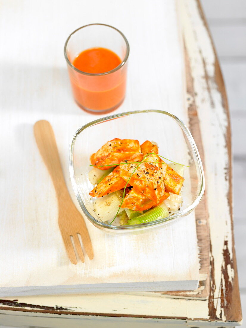 Tofu in romesco sauce and served with leeks