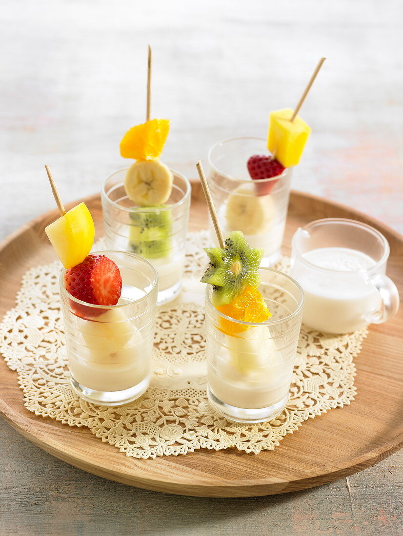 Fruit brochettes with coconut milk