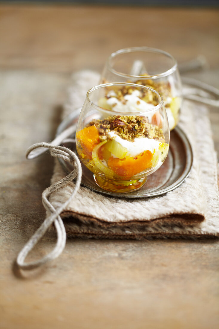 Diced pumpkin and fennel topped with crushed hazelnuts and pistachios