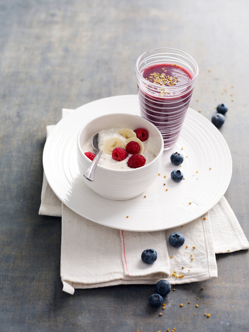 Budwig cream and a glass of blueberry smoothie